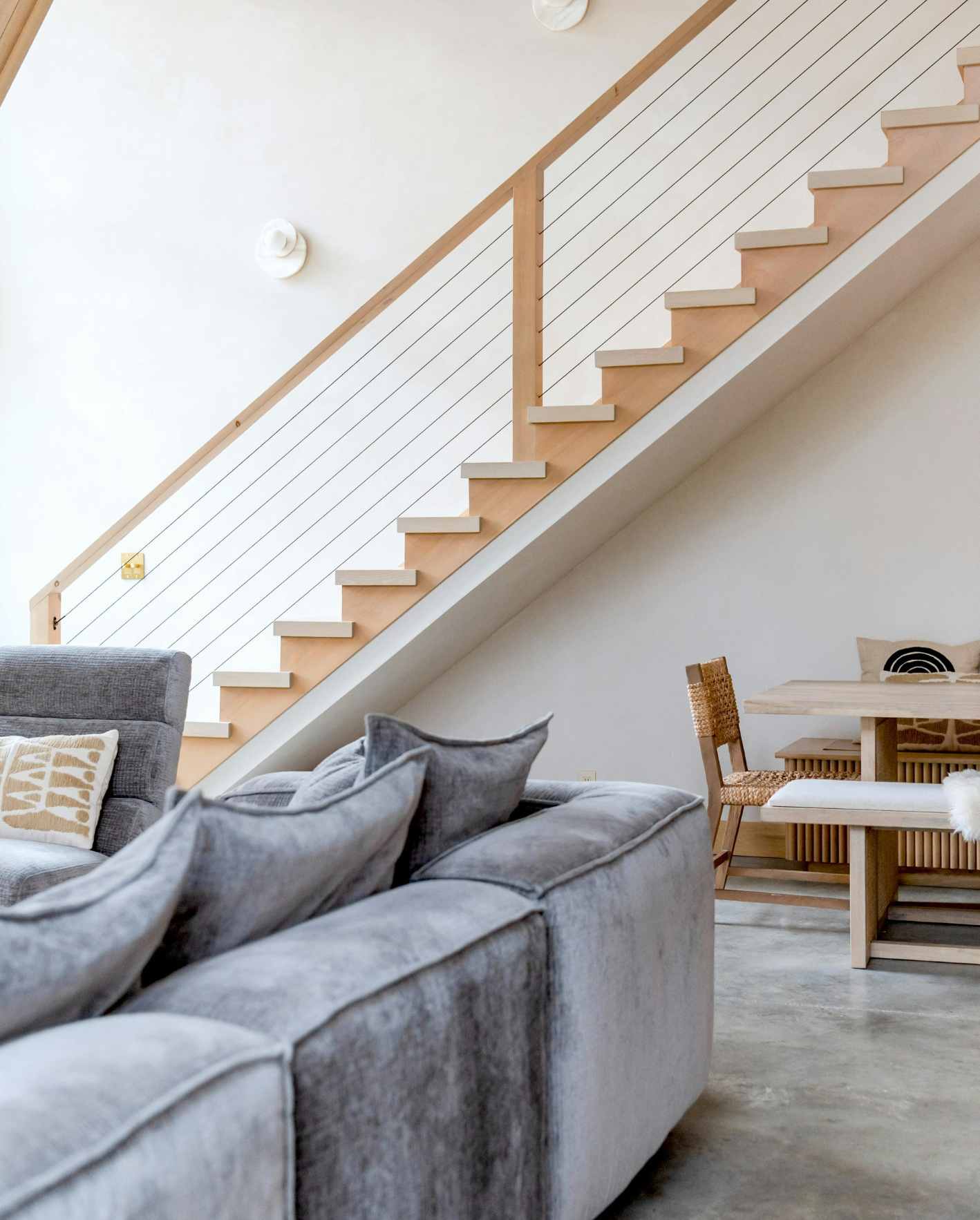 A bright, professionally styled short-term rental interior with modern furnishings, open living space, and polished guest-ready details, highlighting how Park Place Properties helps Miami Airbnb owners deliver a premium guest experience through concierge support.