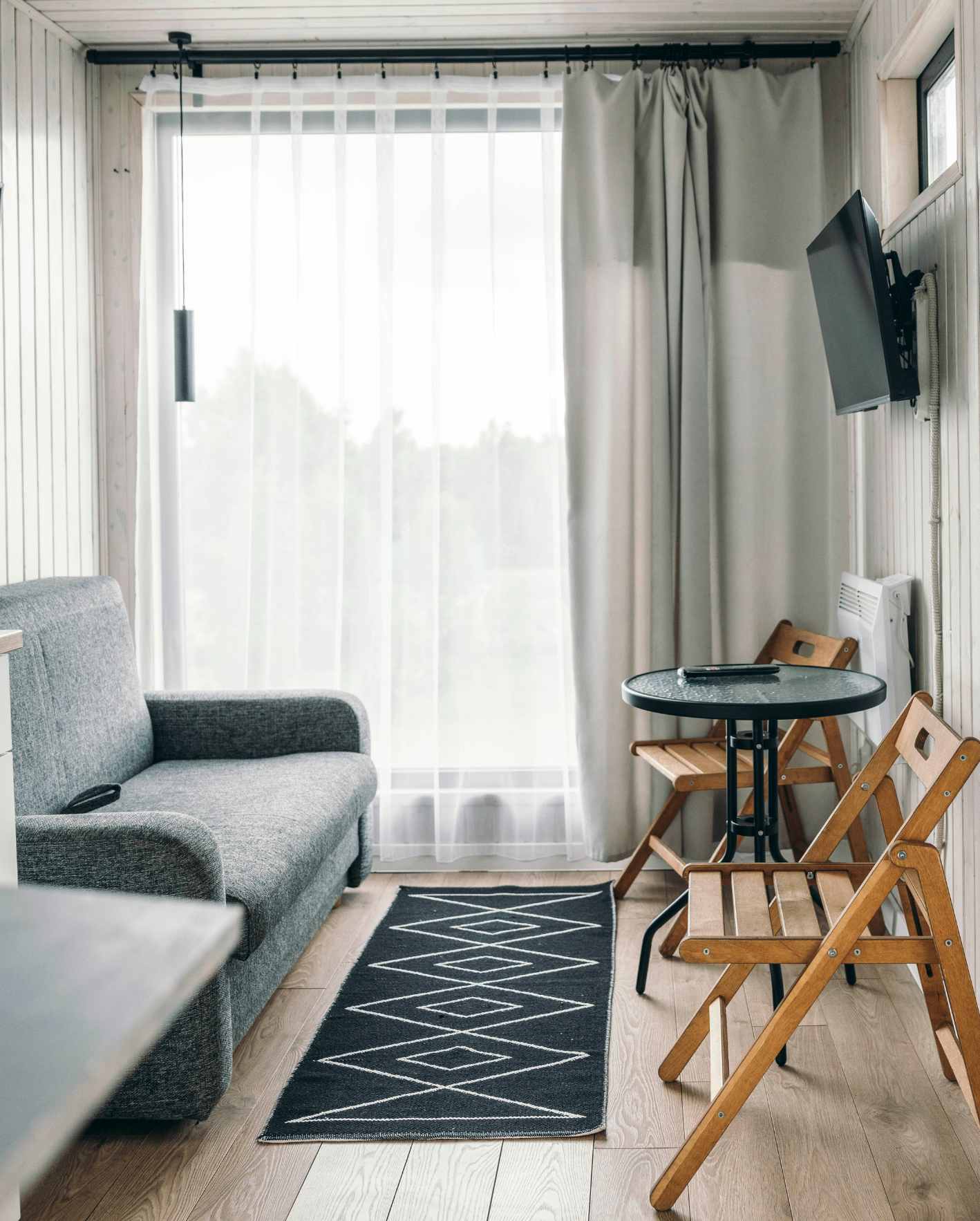 A clean, well-lit short-term rental living area with guest-ready furnishings, highlighting how Park Place Properties helps Miami Airbnb owners improve listing presentation, attract more bookings, and showcase their property with professional photography.