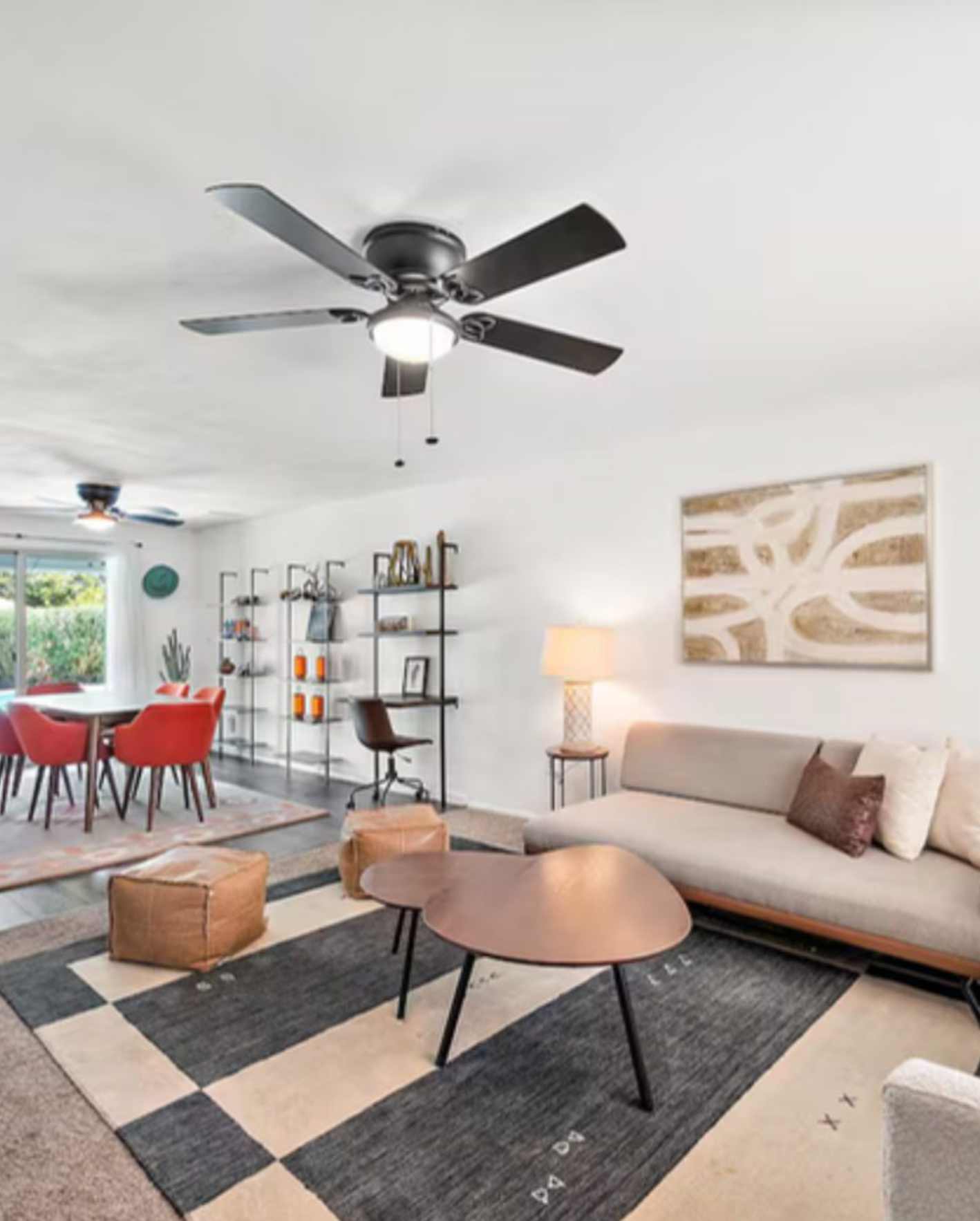 Modern Scottsdale Airbnb living room with contemporary furniture, open-concept layout, and professionally staged interior designed to support Airbnb price optimization and higher booking performance.